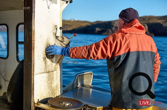  scots man qorking on boat 